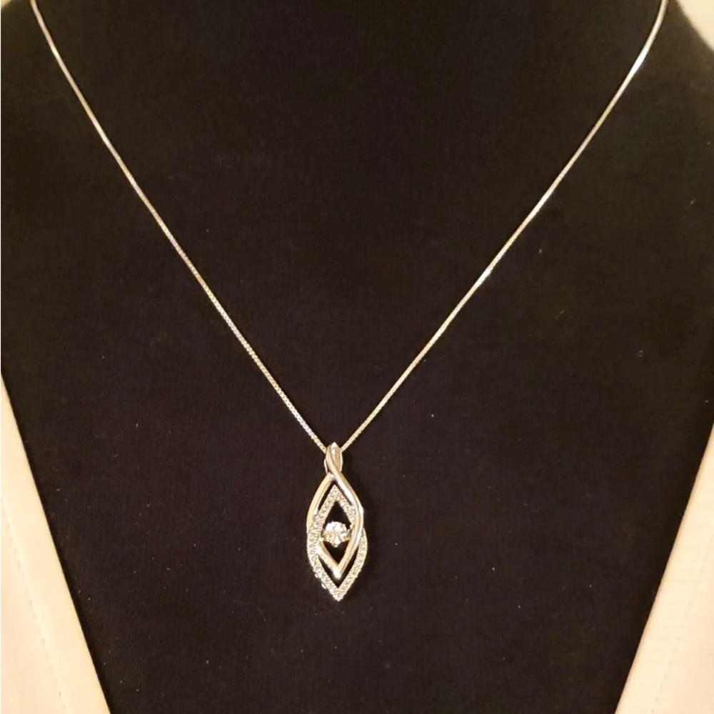 *Just sold* Silver floating diamond necklace. 18” chain. 925 silver.
